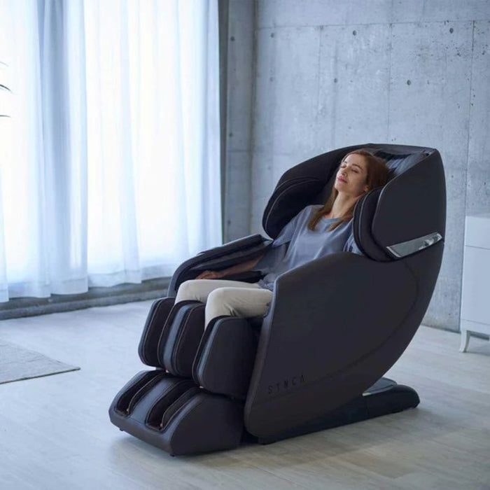 Synca Hisho Massage Chair with woman sitting.